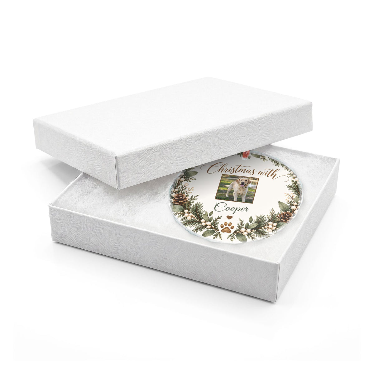 Round pet photo glass ornament in an open white gift box