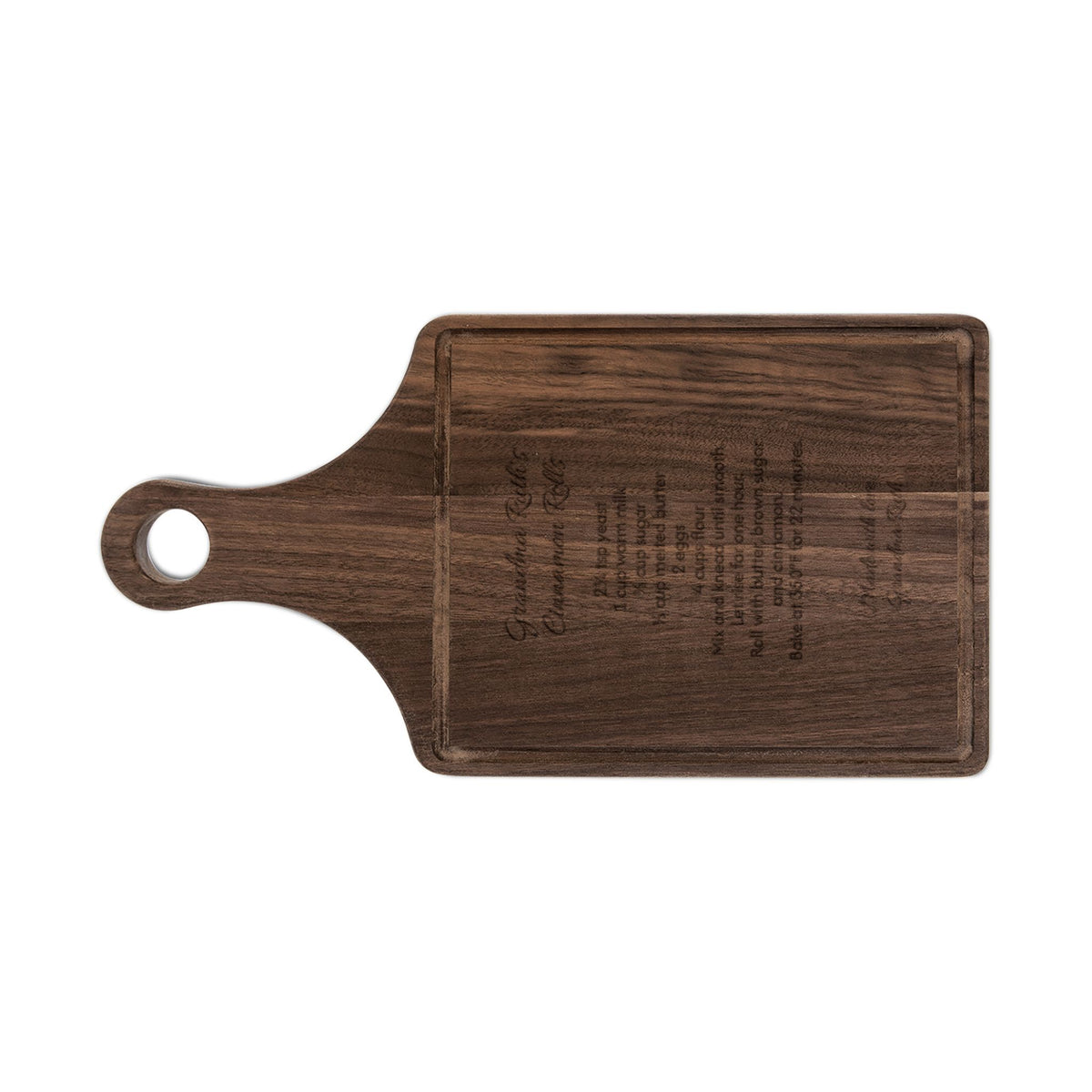 Grandma's recipe cutting board, walnut paddle board with drip ring, engraved with Grandma Ruth's Cinnamon Rolls recipe