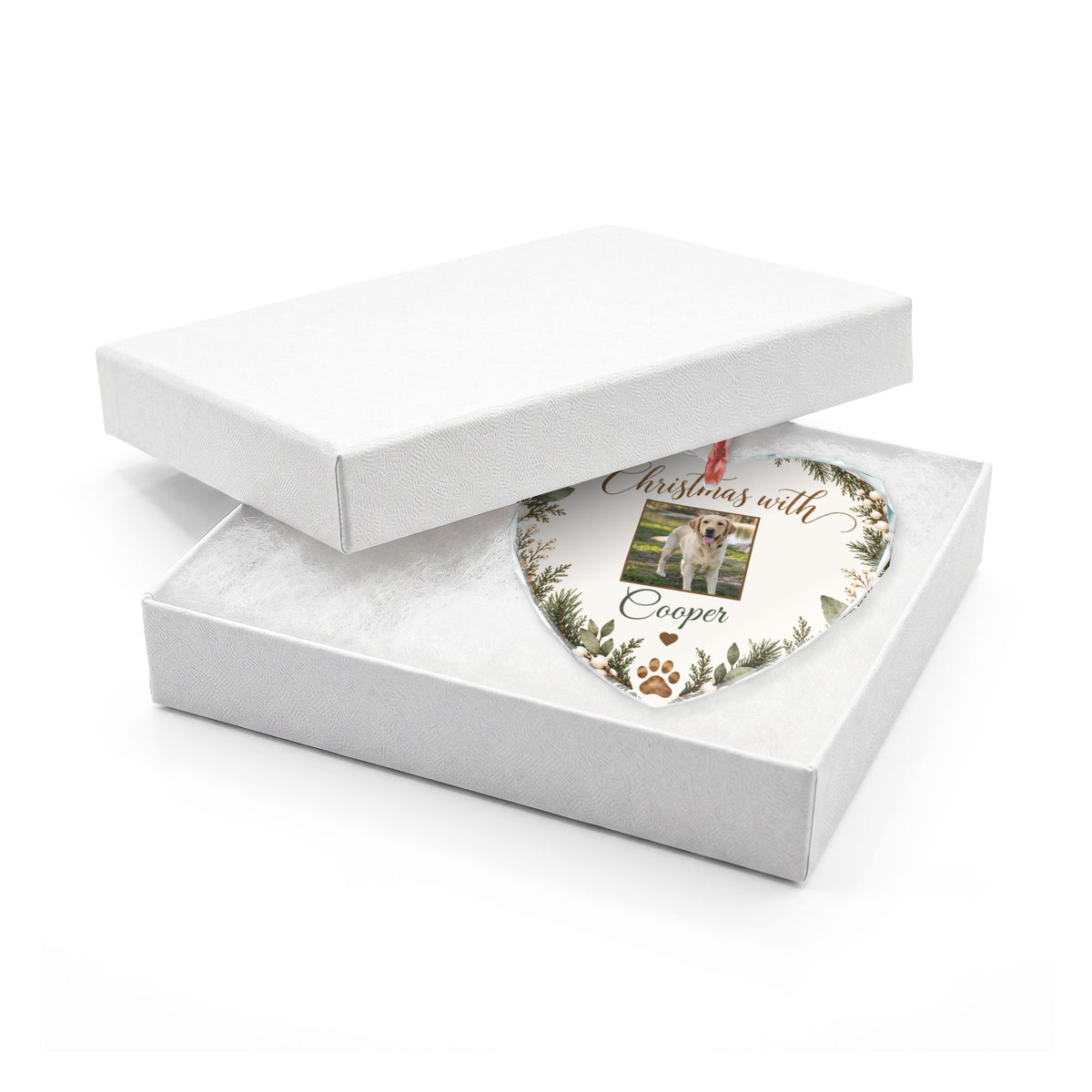 Heart-shaped pet photo glass ornament in an open white gift box