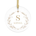 Personalized monogram Christmas ornament, clear acrylic with gold initial S, name Sophia and a botanical wreath