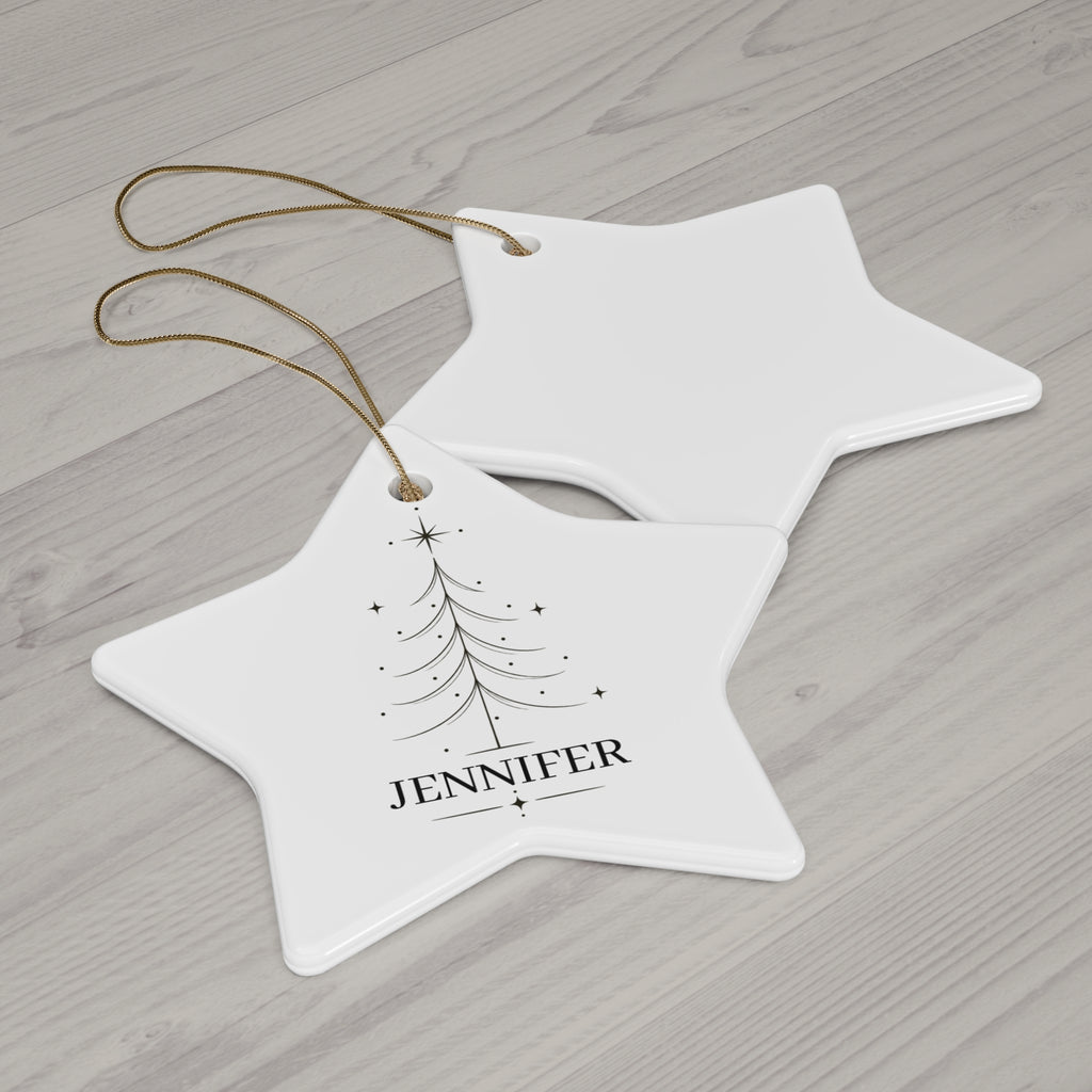 Star Christmas tree name ornament with its blank back side on a wooden table