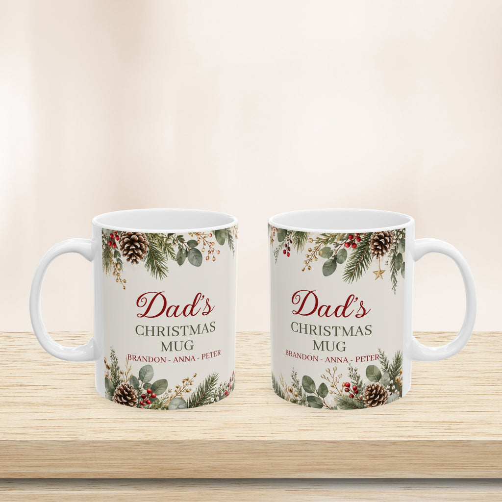 11 oz and 15 oz personalized Dad Christmas mugs side by side on a wooden shelf