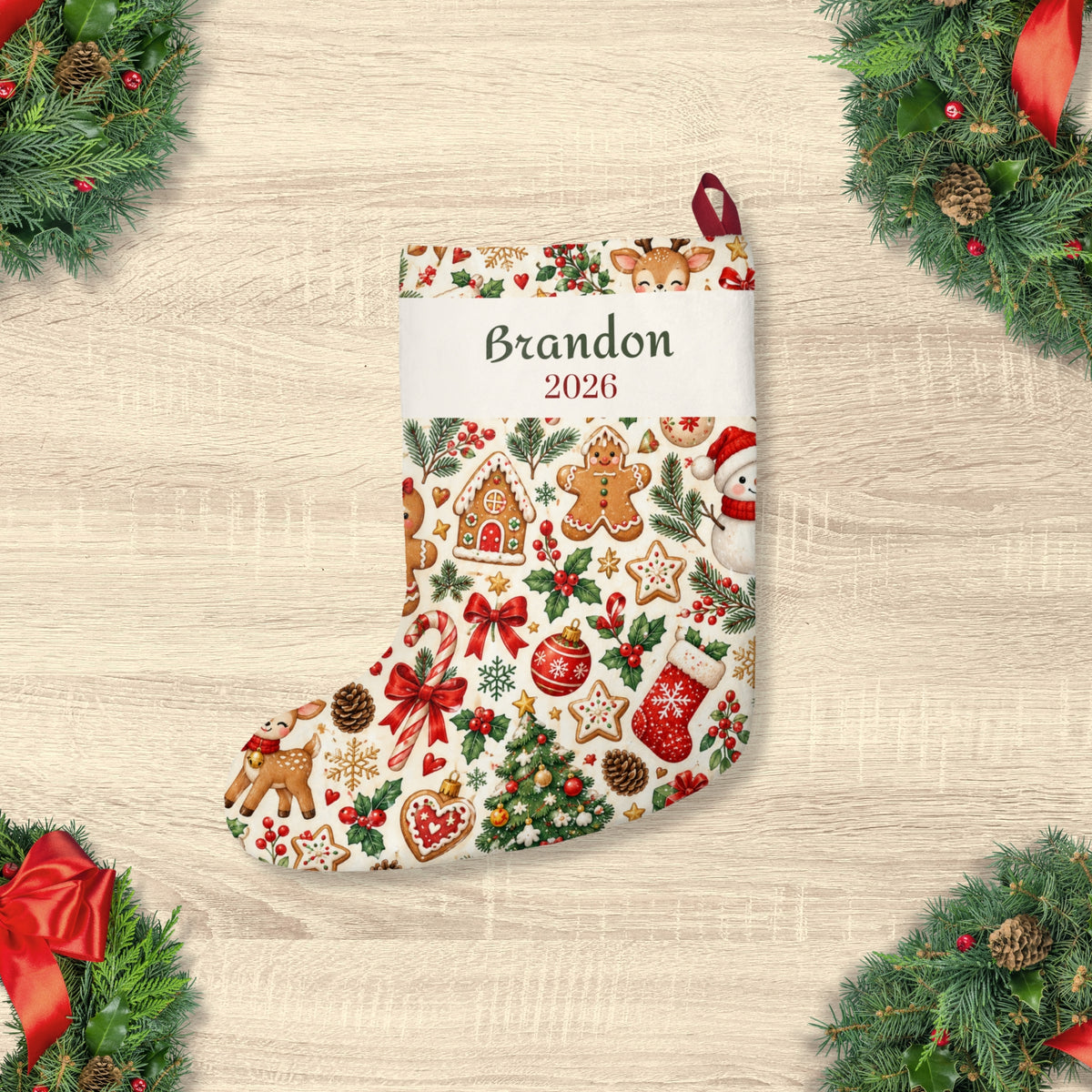 Baby's first Christmas stocking with name Brandon and 2026 on the cuff, gingerbread cookie print