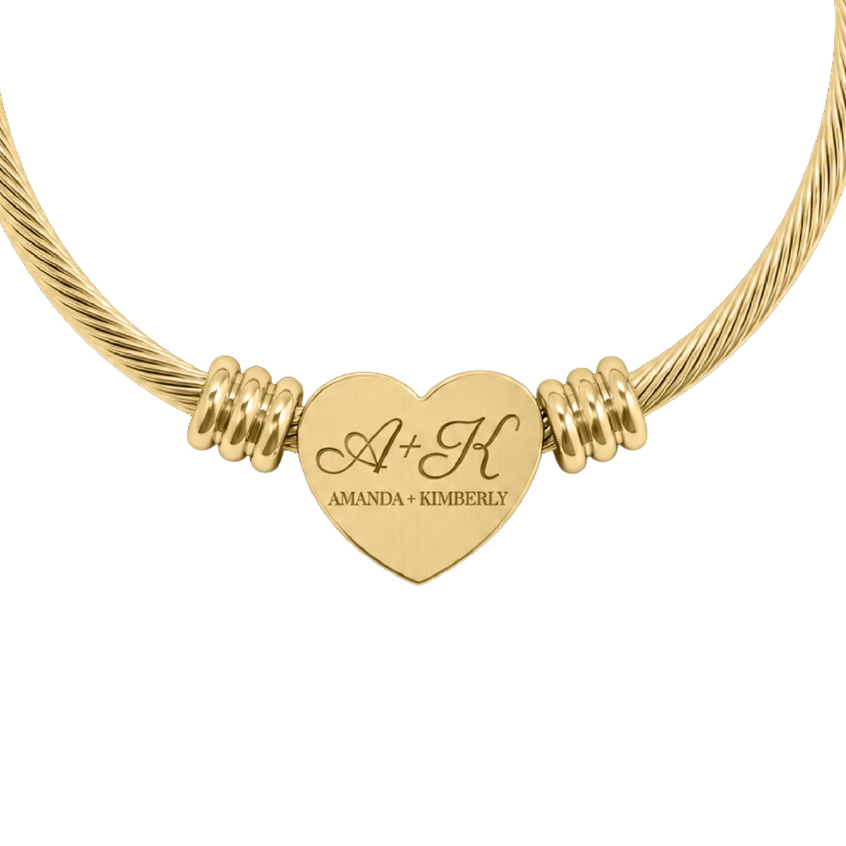 Best friend heart cuff bracelet in gold finish, heart charm engraved with two initials and both names, close-up