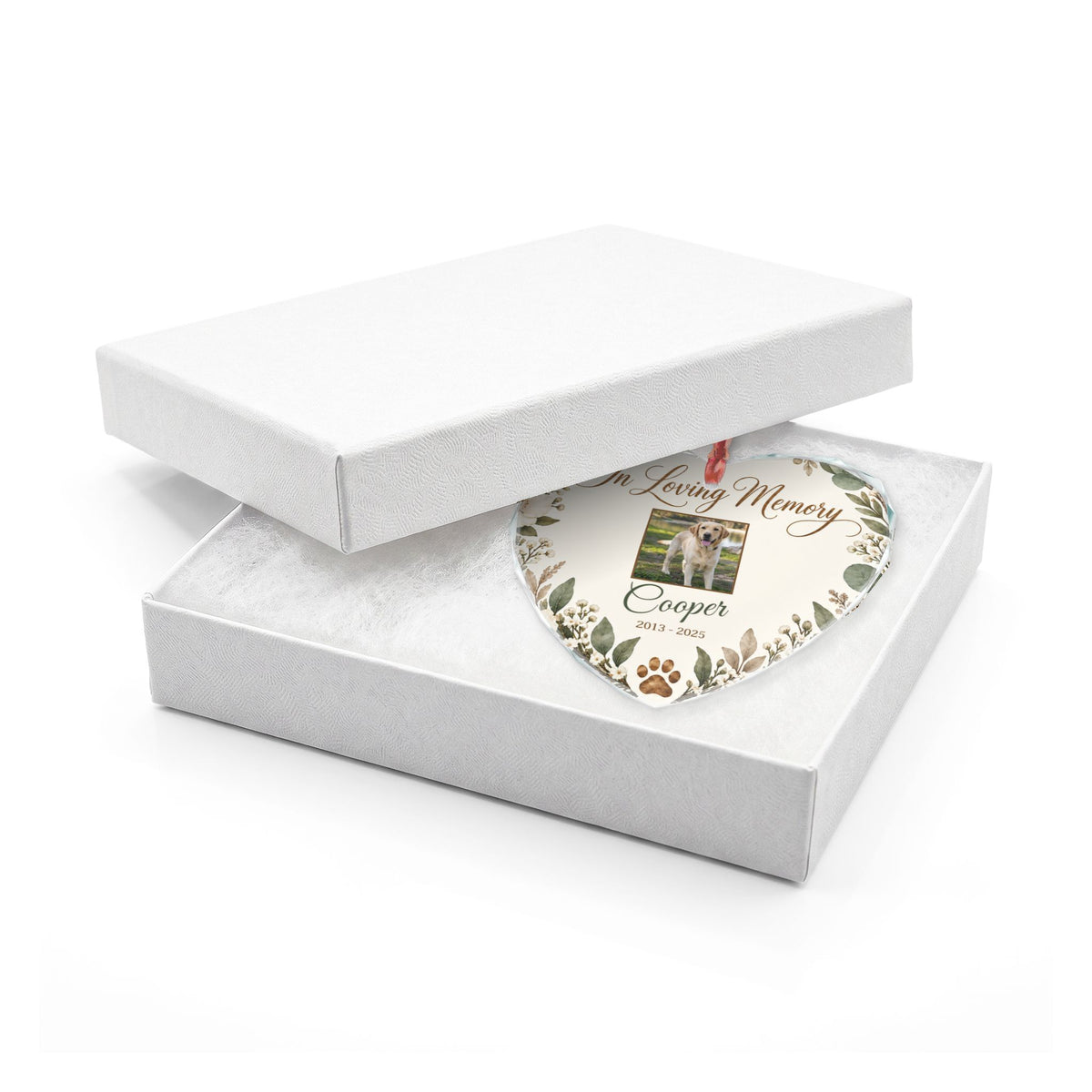 Heart-shaped pet memorial ornament in an open white gift box