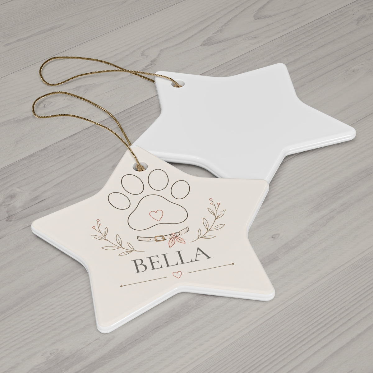 Star paw print pet ornament with its blank back side on a wooden table