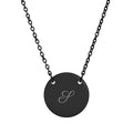 Personalized initial disc necklace in black, engraved with a script initial J