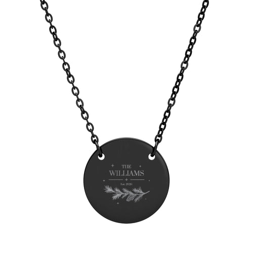 Family name necklace in black, engraved with The Williams, an established year and a pine branch