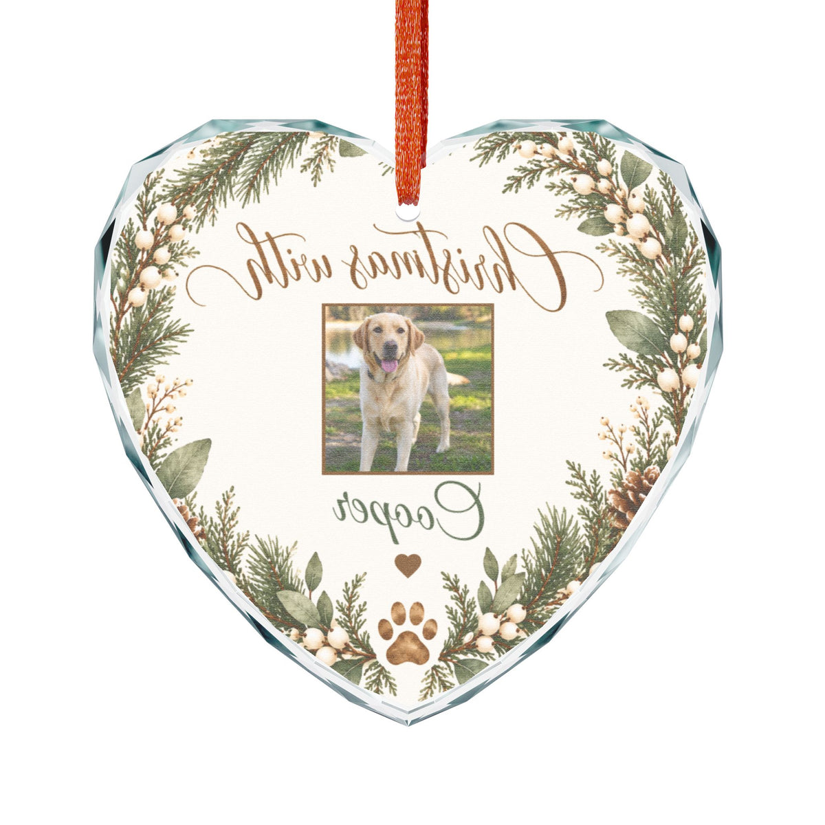 Heart glass pet ornament seen from the back with red hanging ribbon