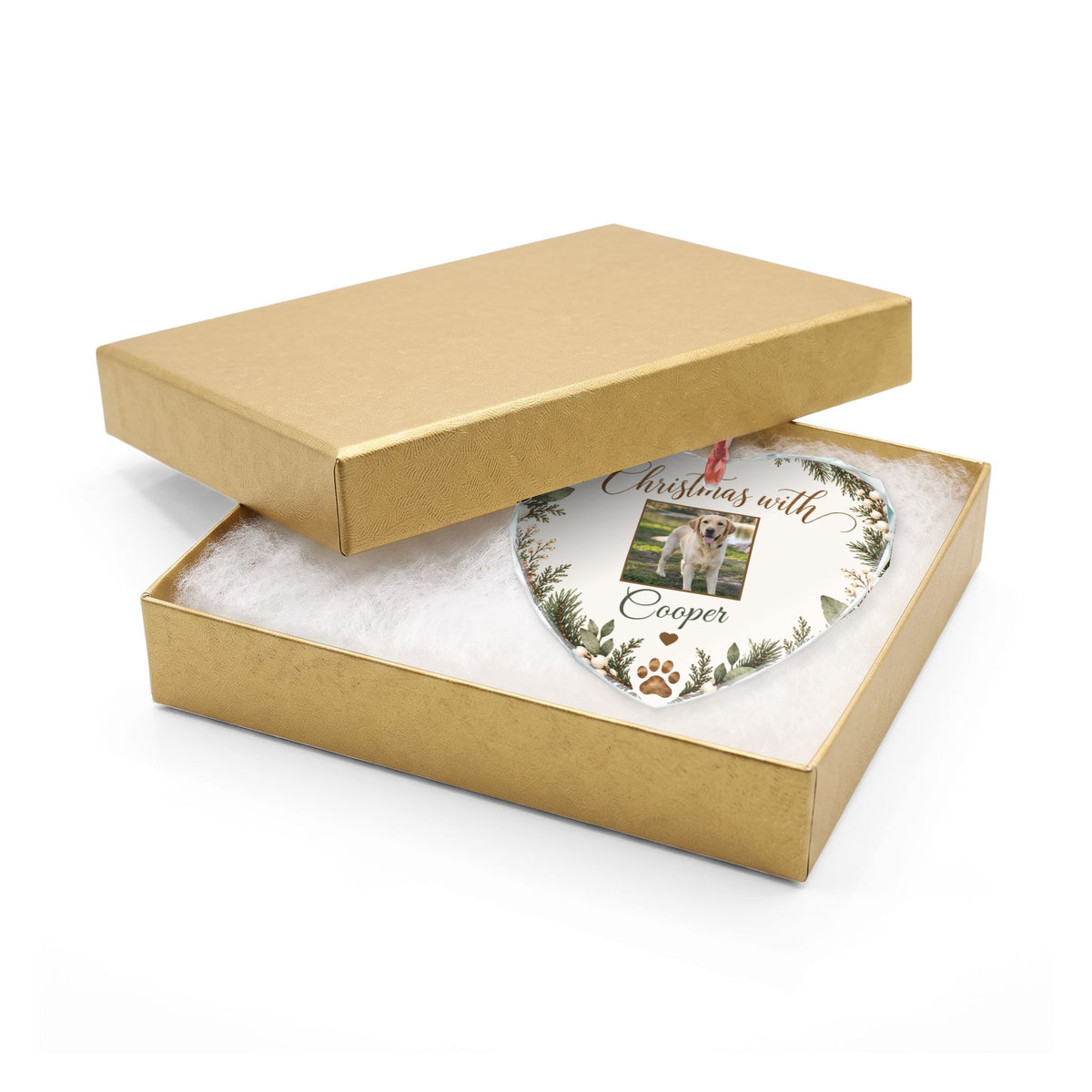 Heart-shaped pet photo glass ornament in an open gold gift box