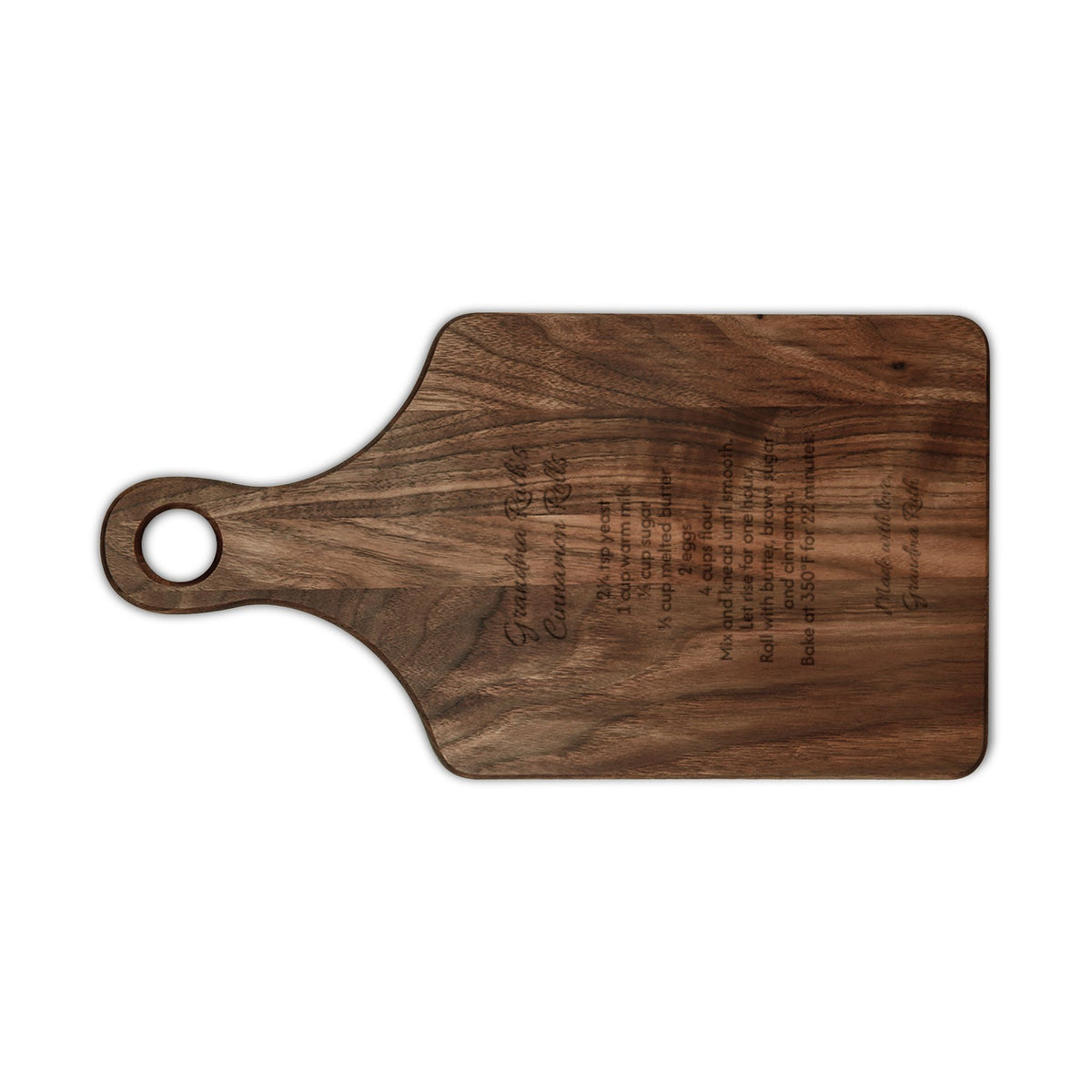 Grandma's recipe cutting board, walnut paddle board, engraved with Grandma Ruth's Cinnamon Rolls recipe