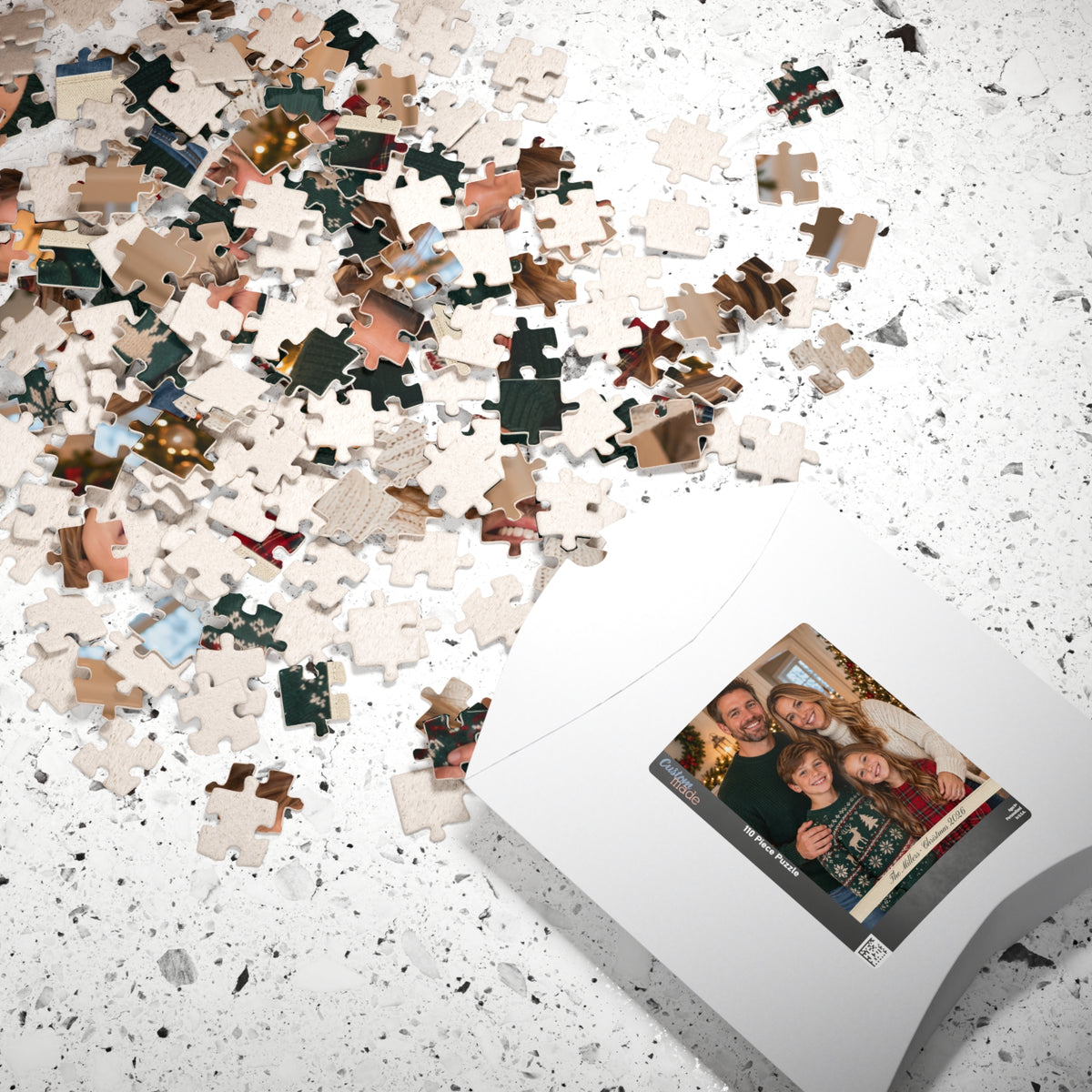 Scattered jigsaw pieces around the personalized photo puzzle box
